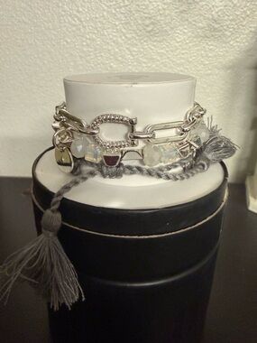 Layered Silver-Tone Bracelet Stack with Gray Tassel